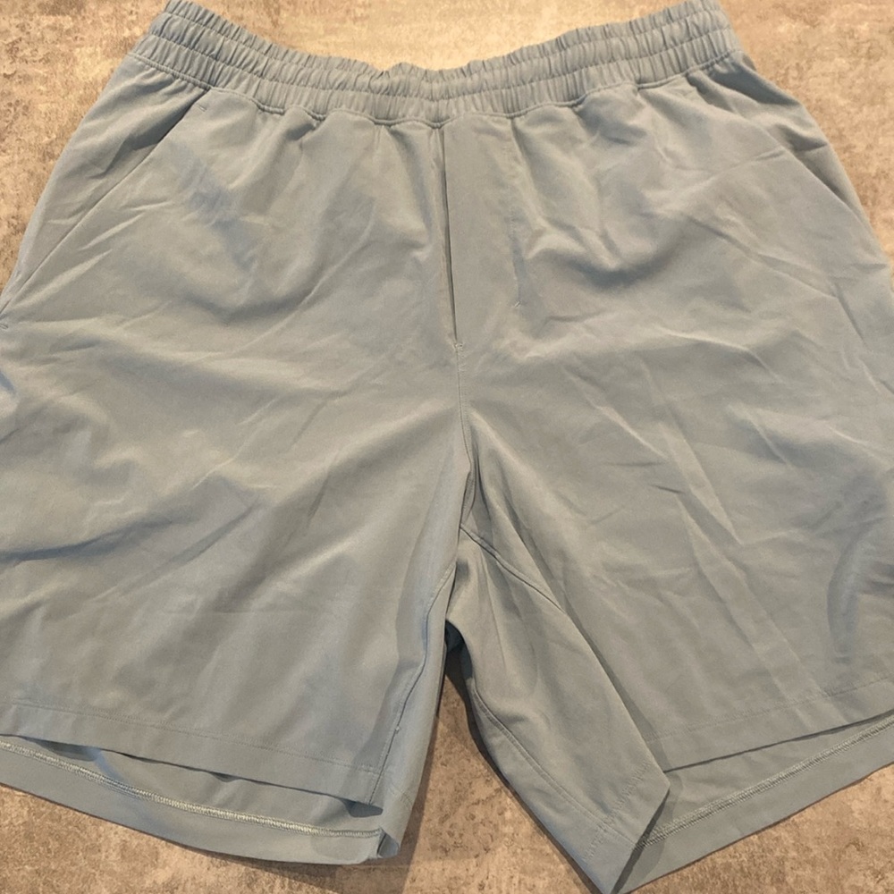 Lulu Pacebreaker Light Blue
- Liner Cut Out 
- Size Large 7” Inseam